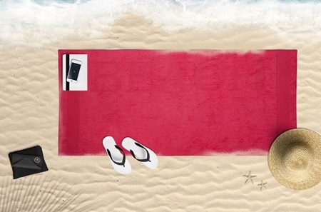 Serviette de plage unie